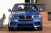 2013 BMW X5 M in Monte Carlo Blue Metallic from a frontal view